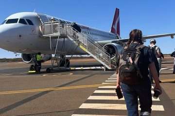 boarding a flight to a mine site